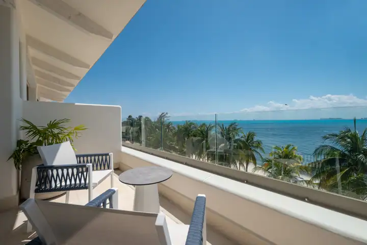The balcony of Double Room 3 at Casa Azul above the beach