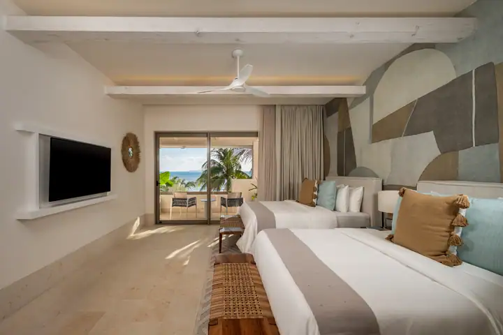 Double Room 6 at Casa Azul with two queen beds and a garden view