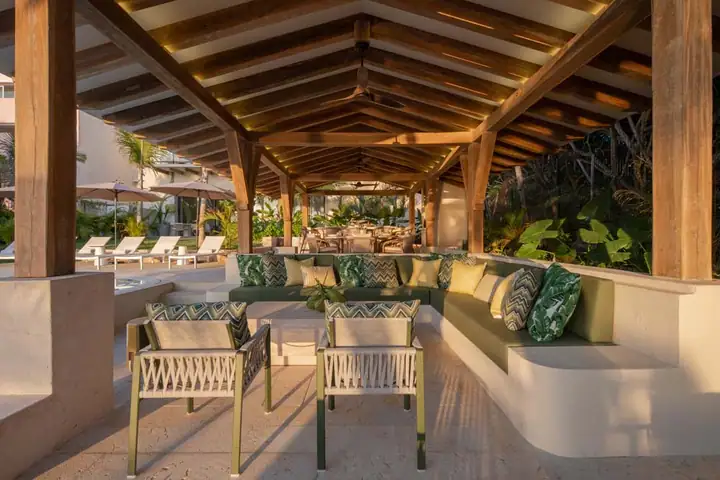The shaded palapa lounge at Casa Ceiba