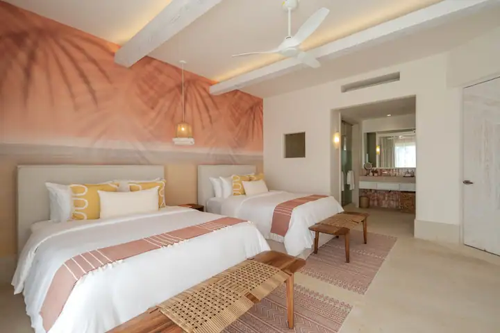 Double Room 6 at Casa Coral with two queen beds and a terrace view