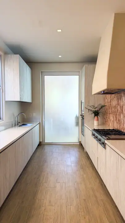 The kitchen at Casa Coral with its tiled splashback