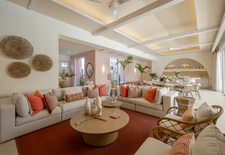 The living room at Casa Coral in coral and cream tones