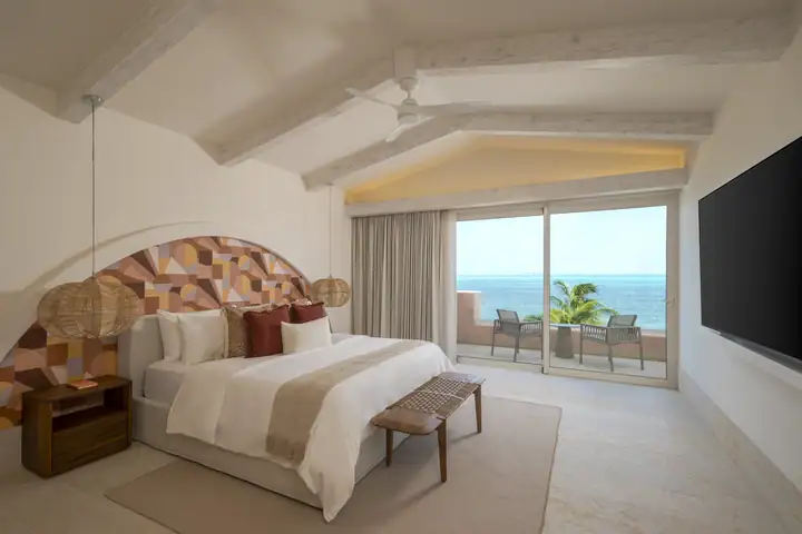 Master Suite 1 at Casa Coral facing its balcony and the Caribbean