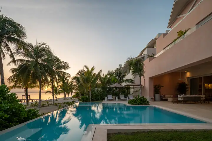 Sunset over the pool at Casa Coral