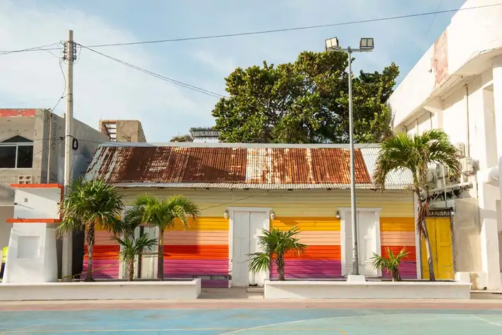 A colourful painted house on a street in Isla Mujeres town