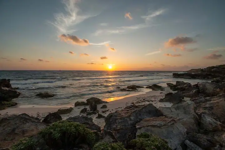 Sunrise over the rocky Caribbean shore of Isla Mujeres