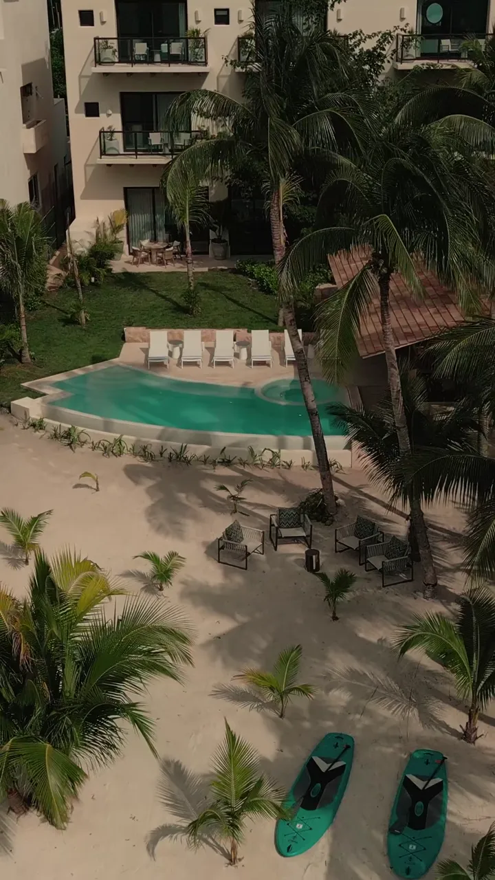 Casa Ceiba&rsquo;s pool and beach from above &mdash; play the film
